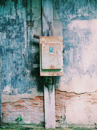 Close-up of mailbox on wall