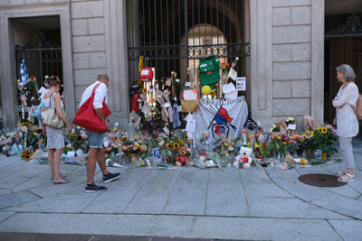 Group of people in front of building