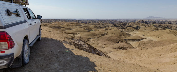 Panoramic view of desert against sky