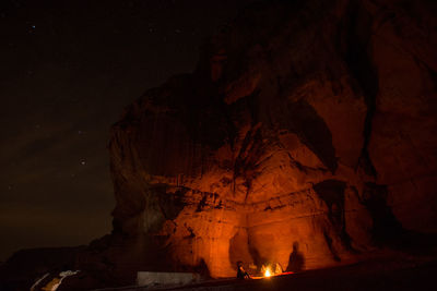 Shadow of people on rock