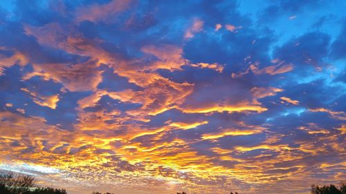 Low angle view of dramatic sky