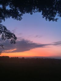 Scenic view of silhouette landscape against sky during sunset