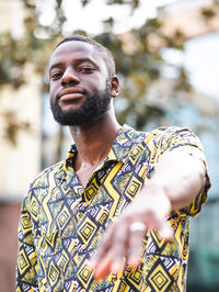 Portrait of young man looking away