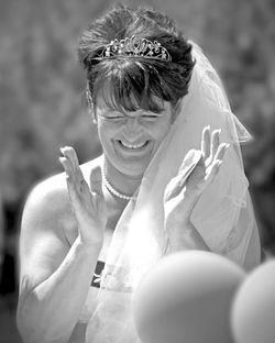 Portrait of a smiling young woman outdoors