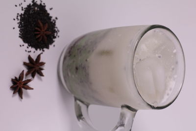 Close-up of beer glass on table