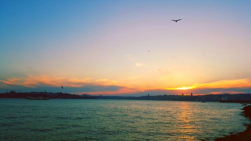 Scenic view of sea at sunset