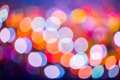 Defocused image of illuminated colorful lights