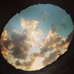 Low angle view of silhouette mountain against sky