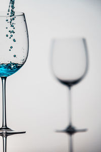 Close-up of water drops on glass table