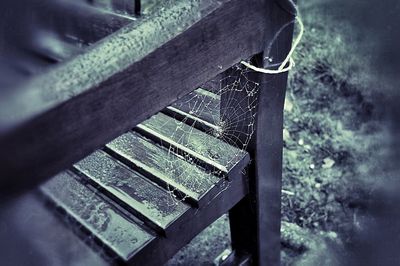 Close-up of old metal bench