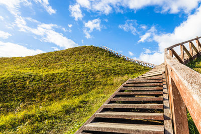 Low angle view of staircase against sky