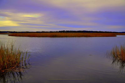 Reflection of clouds in calm lake