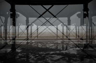 Bridge over sea against sky