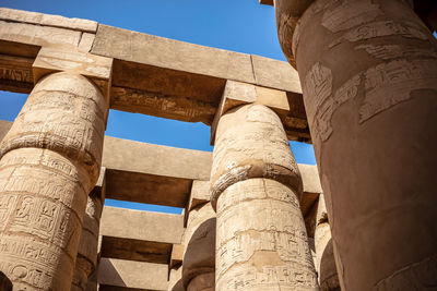 Different hieroglyphs on the walls and columns in the karnak temple. 