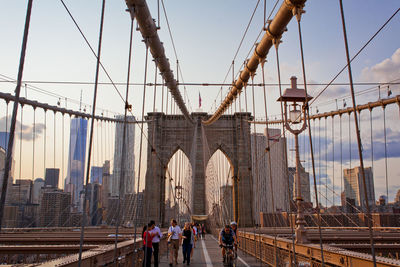 People on brooklyn bridge at manhattan