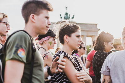 Group of people looking away outdoors