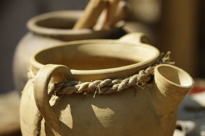 Close-up of rope tied on wood