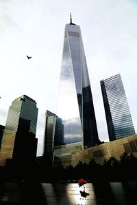 Low angle view of skyscrapers against sky