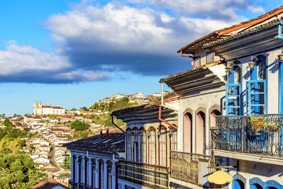 Old colonial style houses and baroque church  in the historic town of ouro preto in minas gerais