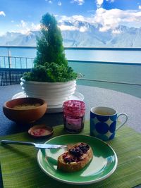 Close-up of food on table against sky