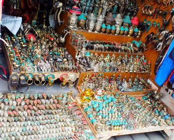 High angle view of figurines for sale