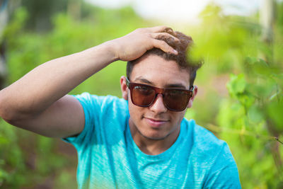 Portrait of young man wearing sunglasses