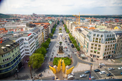 High angle view of street amidst buildings in city