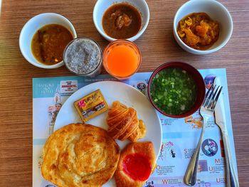 High angle view of breakfast served on table