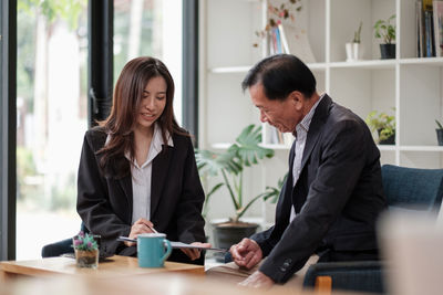 Business colleagues working at office