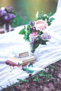 Close-up of pink flower vase on table
