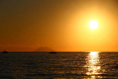 View of calm sea at sunset