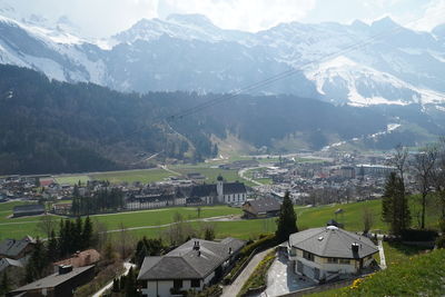 High angle view of townscape against mountains