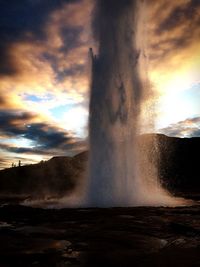 Scenic view of sea against cloudy sky