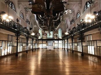 Illuminated chandelier in building