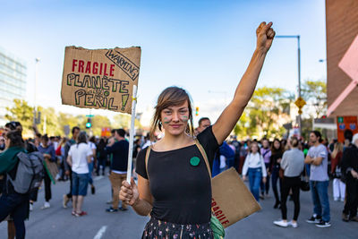 Women standing on street in city