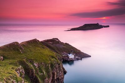 Scenic view of sea against sky during sunset