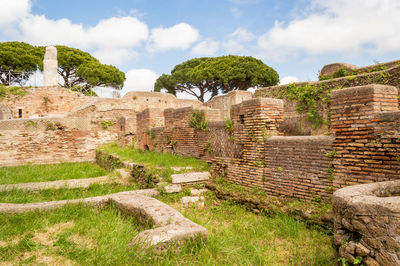 Old ruin building against cloudy sky