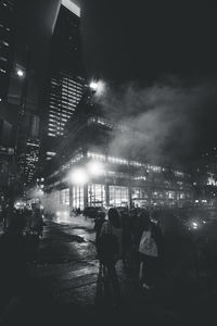 Modern buildings in city at night