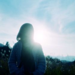 Woman standing on field