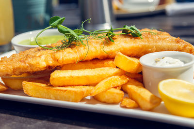 Close-up of food served on table