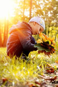 Close-up of boy on field