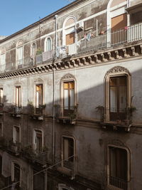 Low angle view of old building in city