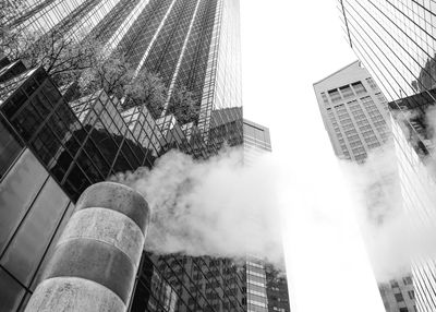 Low angle view of skyscrapers in city