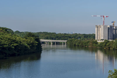 Bridge over river against sky