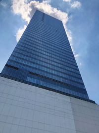 Low angle view of modern building against sky