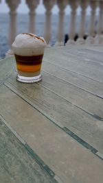 Close-up of beer glass on table