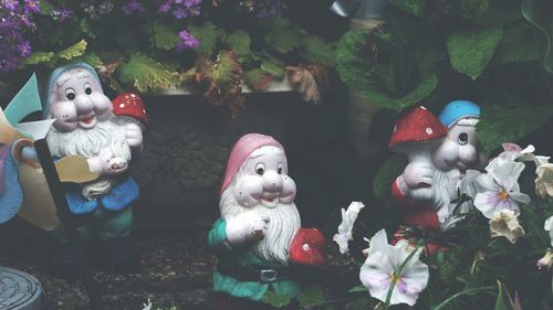 Close-up of stuffed toy against plants