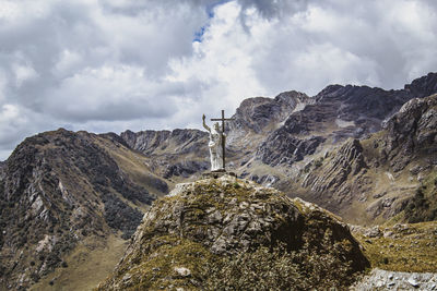 Statue of jesus at the end of a tunnel on the way to chavin