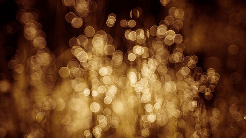 Defocused image of illuminated lights at night