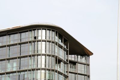 Low angle view of modern building against clear sky